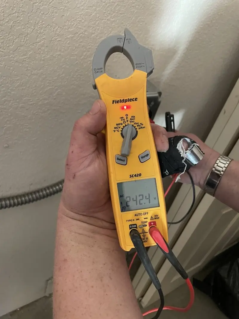 Voltage testing with clamp meter during Aluminum Wiring Replacement in Warsaw